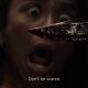 Connie assustada encarando uma faca com sangue na 11ª temporada de The Walking Dead