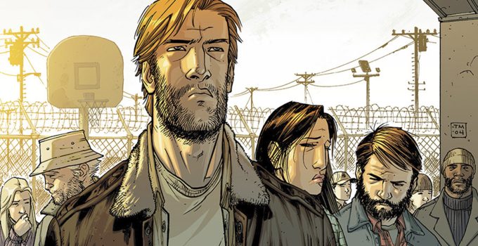 Rick e o grupo no pátio da prisão na capa da edição The Walking Dead 18