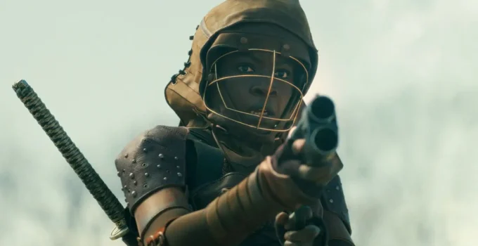 Michonne apontando sua arma em cena do Episódio 2 de The Walking Dead: The Ones Who Live.